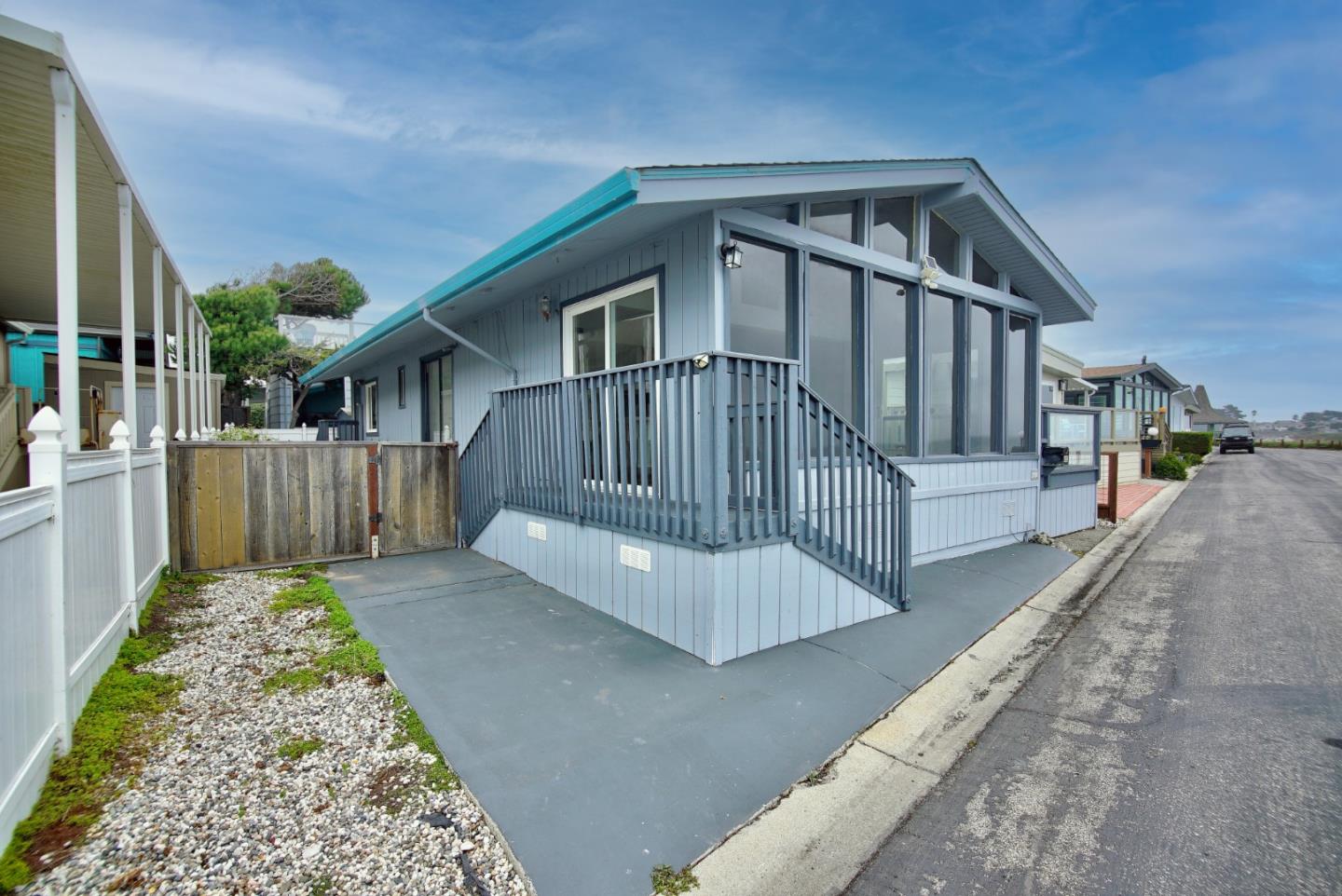 2395 Delaware Avenue, Unit 63 Santa Cruz, CA 95060 - Photo 5 of 16 a view of a house with a yard