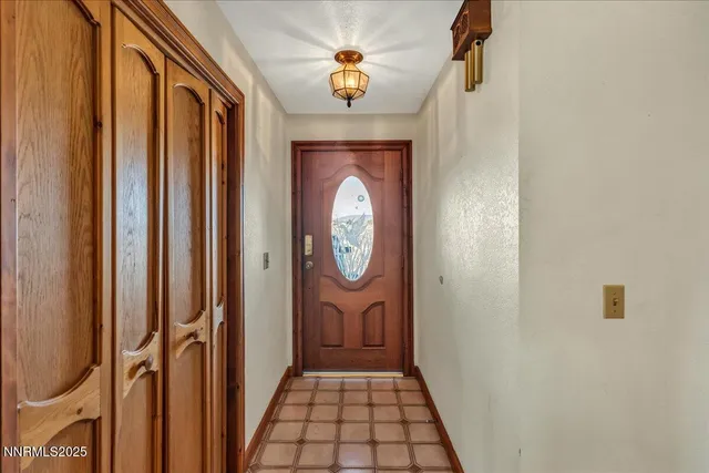 a view of entryway with wooden floor