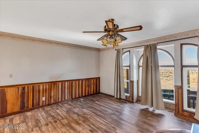 a view of entryway with wooden floor