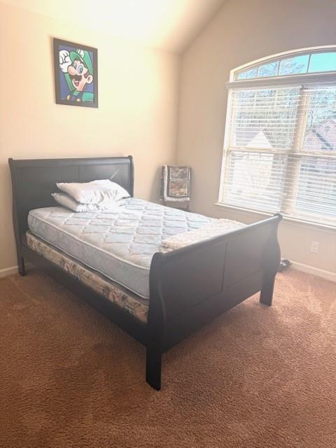 12149 Centerra Drive Hampton, GA 30228 - Photo 35 of 48 a bedroom with a bed and a large window