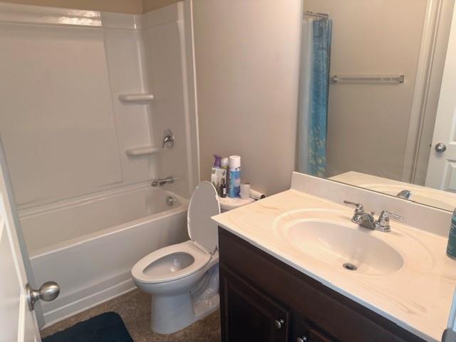 12149 Centerra Drive Hampton, GA 30228 - Photo 37 of 48 a bathroom with a sink toilet and shower