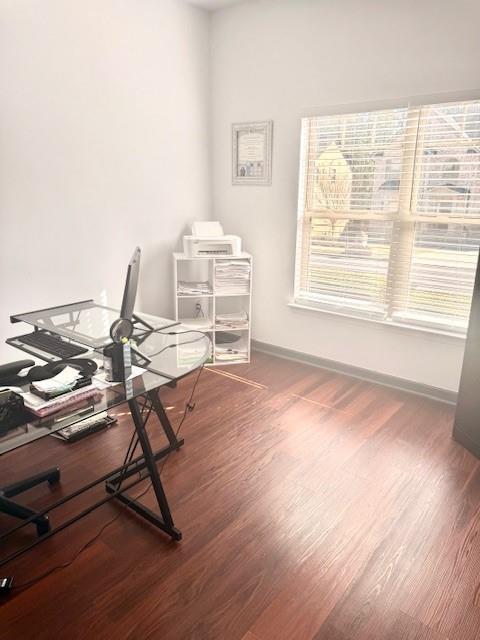 12149 Centerra Drive Hampton, GA 30228 - Photo 9 of 48 a view of a workspace with furniture and a window