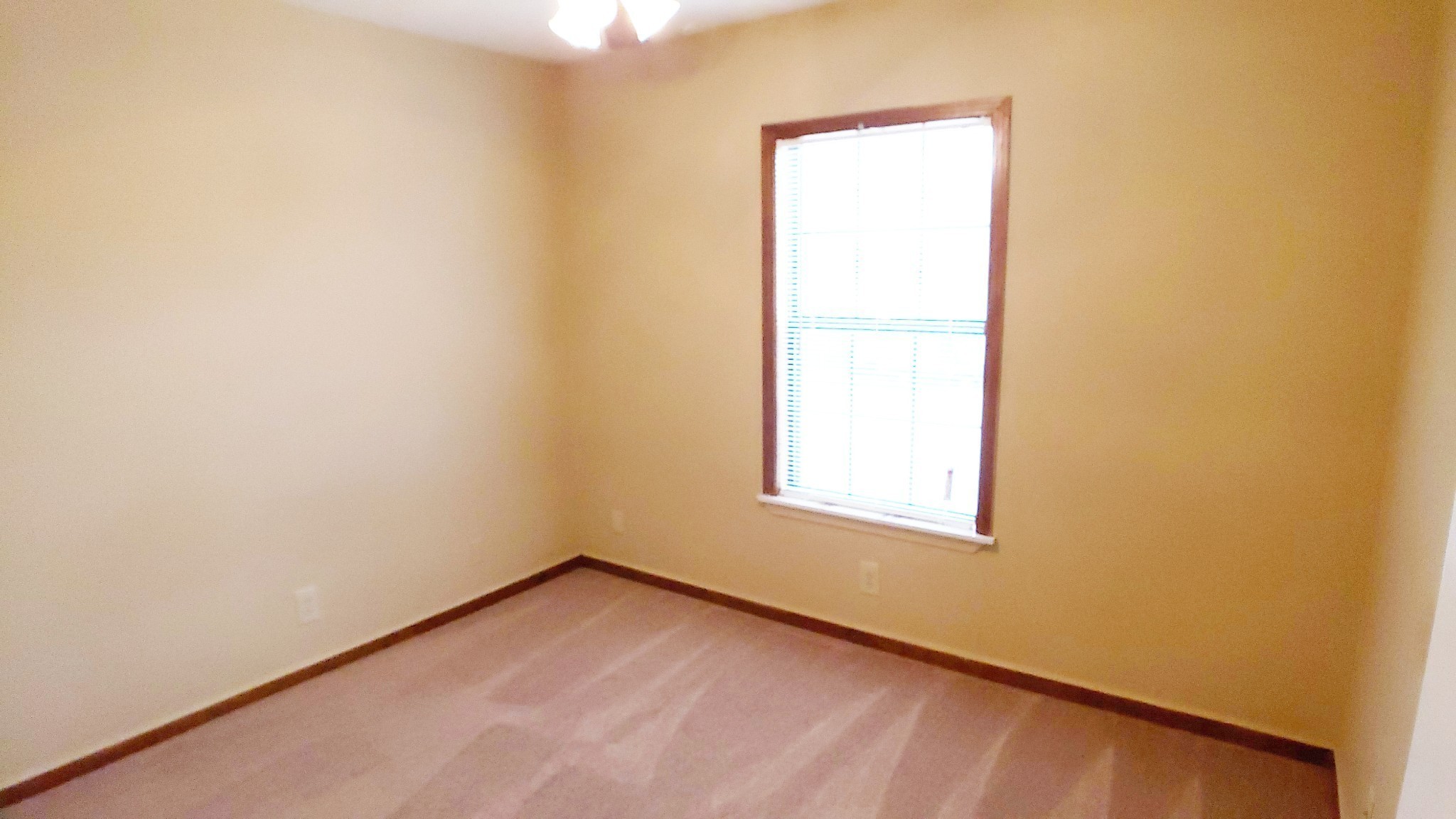 706 Peachers Drive, Unit C Clarksville, TN 37042 - Photo 14 of 15 an empty room with a window