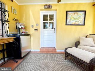 6494 Briggs Road Warrenton, VA 20187 - Photo 13 of 76 Sunroom with Kegerator