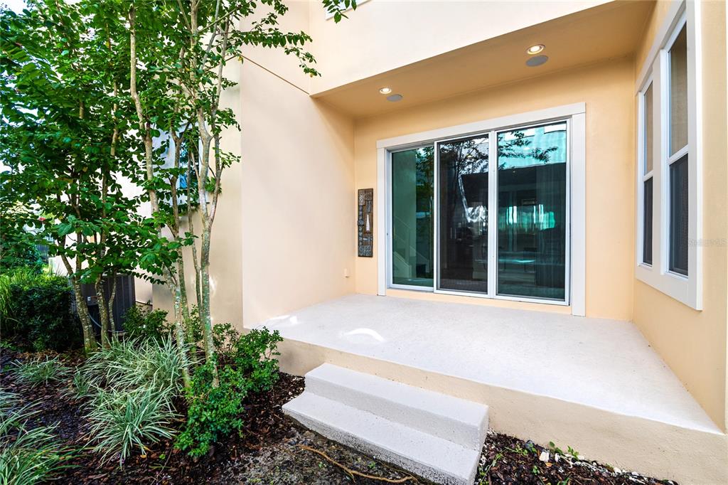 8555 Pinter Street Orlando, FL 32827 - Photo 17 of 32 a house with trees in front of it