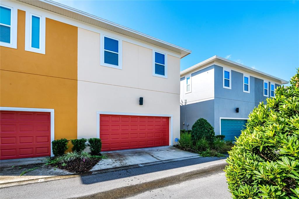 8555 Pinter Street Orlando, FL 32827 - Photo 18 of 32 a front view of a house with a yard
