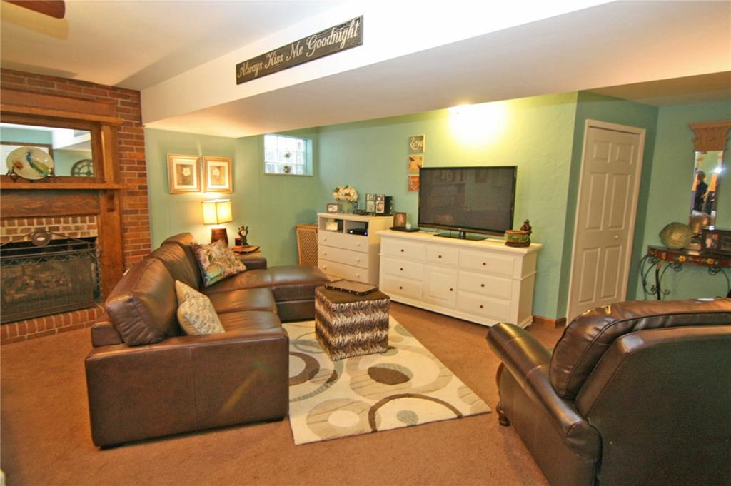 539 Center Church Road Canonsburg, PA 15317 - Photo 22 of 25 Family Room - Perfect for sports parties and movie night...Cozy brick fireplace with antique style mantel surround