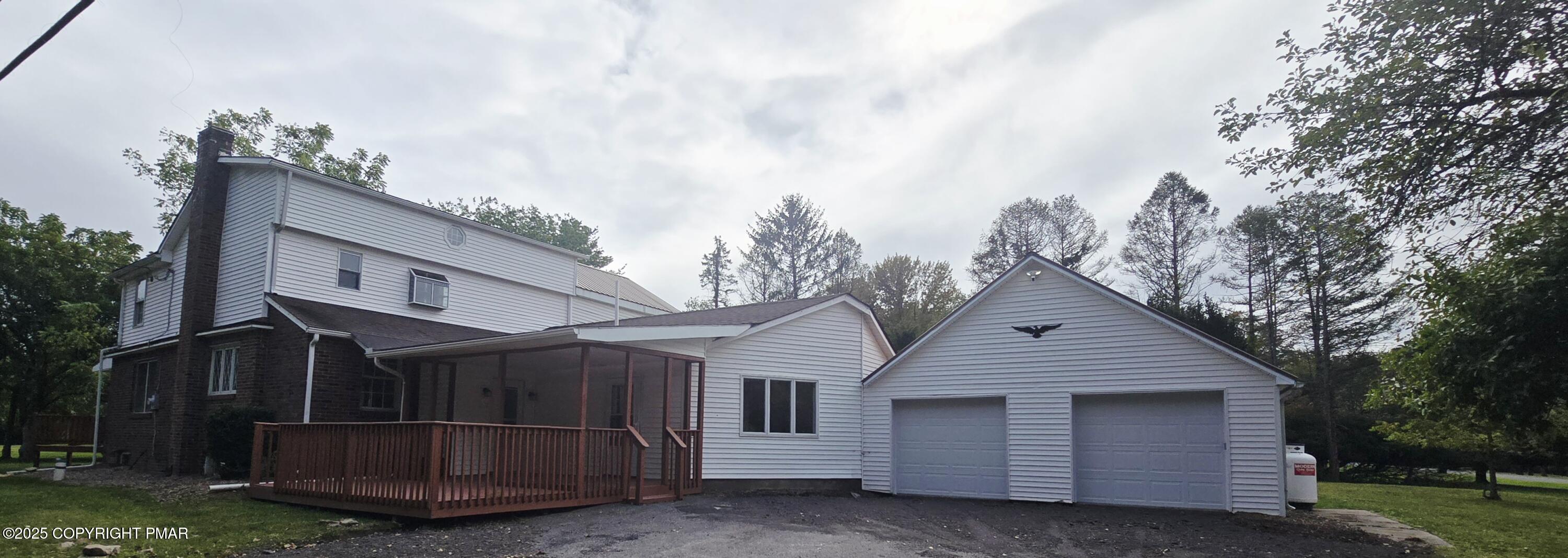 a view of a car in front of house