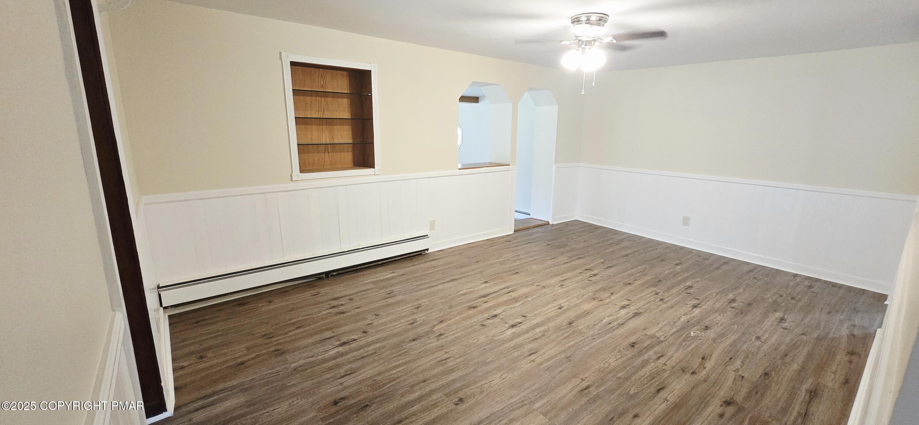117 Rinker Road Stroudsburg, PA 18360 - Photo 12 of 33 an empty room with wooden floor and windows