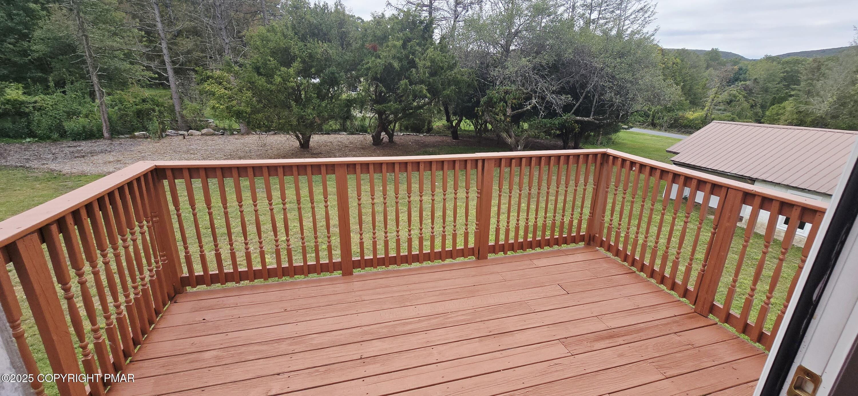 117 Rinker Road Stroudsburg, PA 18360 - Photo 20 of 33 a view of a wooden roof deck