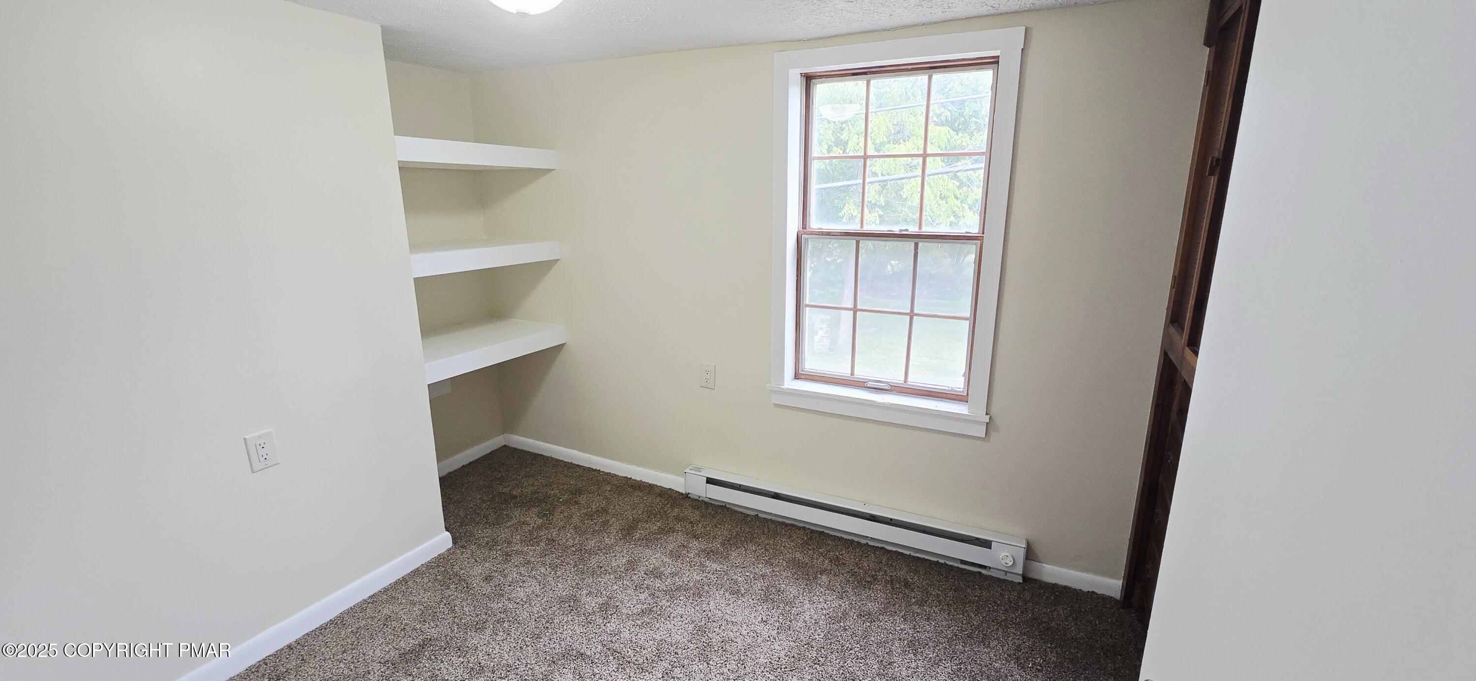 117 Rinker Road Stroudsburg, PA 18360 - Photo 24 of 33 an empty room with windows