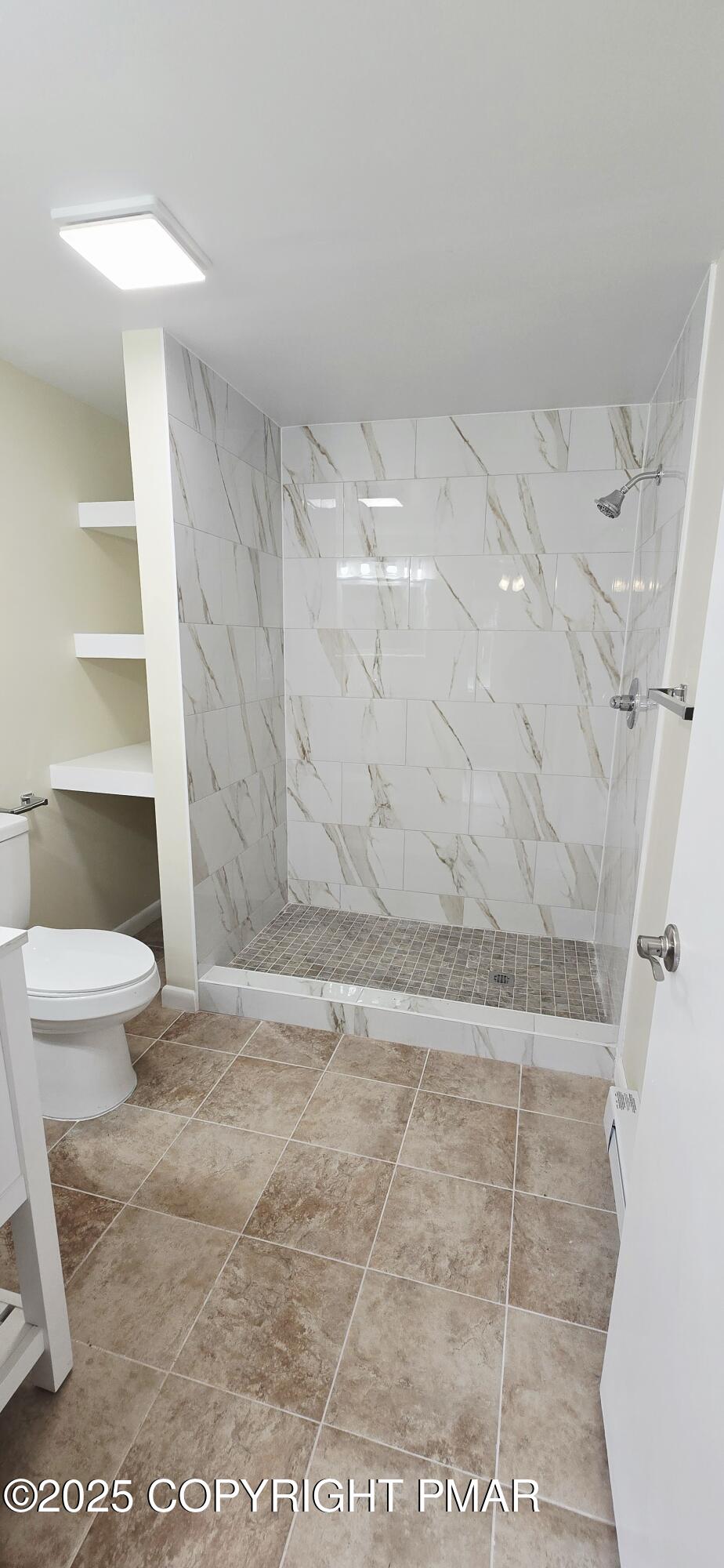 117 Rinker Road Stroudsburg, PA 18360 - Photo 29 of 33 a bathroom with a toilet and a shower