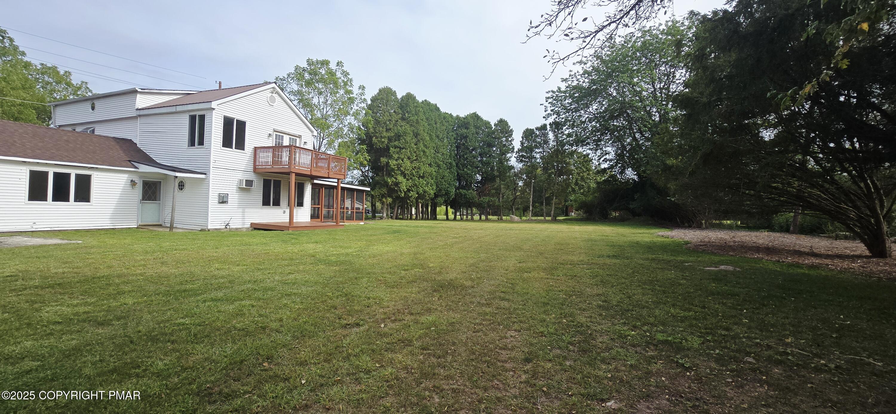 117 Rinker Road Stroudsburg, PA 18360 - Photo 5 of 33 a view of a house with a big yard