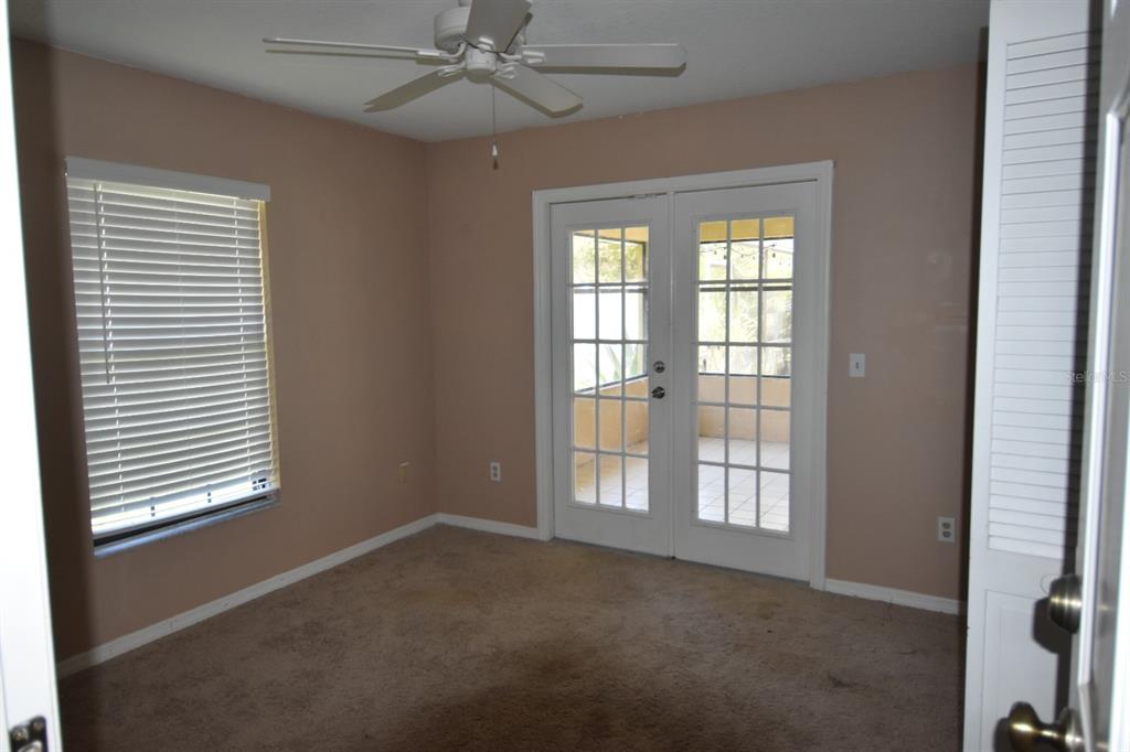 678 Fairchild Avenue Deltona, FL 32725 - Photo 24 of 45 a view of an empty room with a window