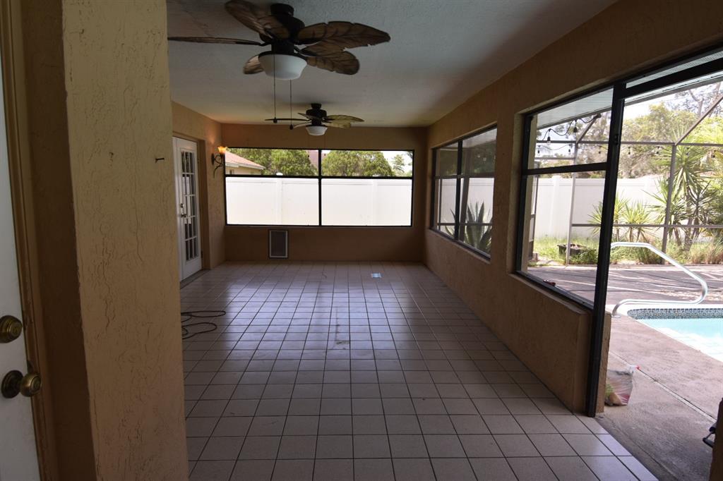 678 Fairchild Avenue Deltona, FL 32725 - Photo 38 of 45 a view of empty room with windows
