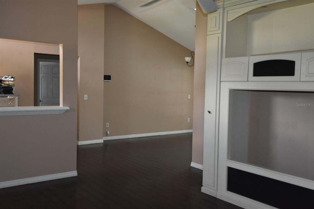 678 Fairchild Avenue Deltona, FL 32725 - Photo 6 of 45 wooden floor in an empty room