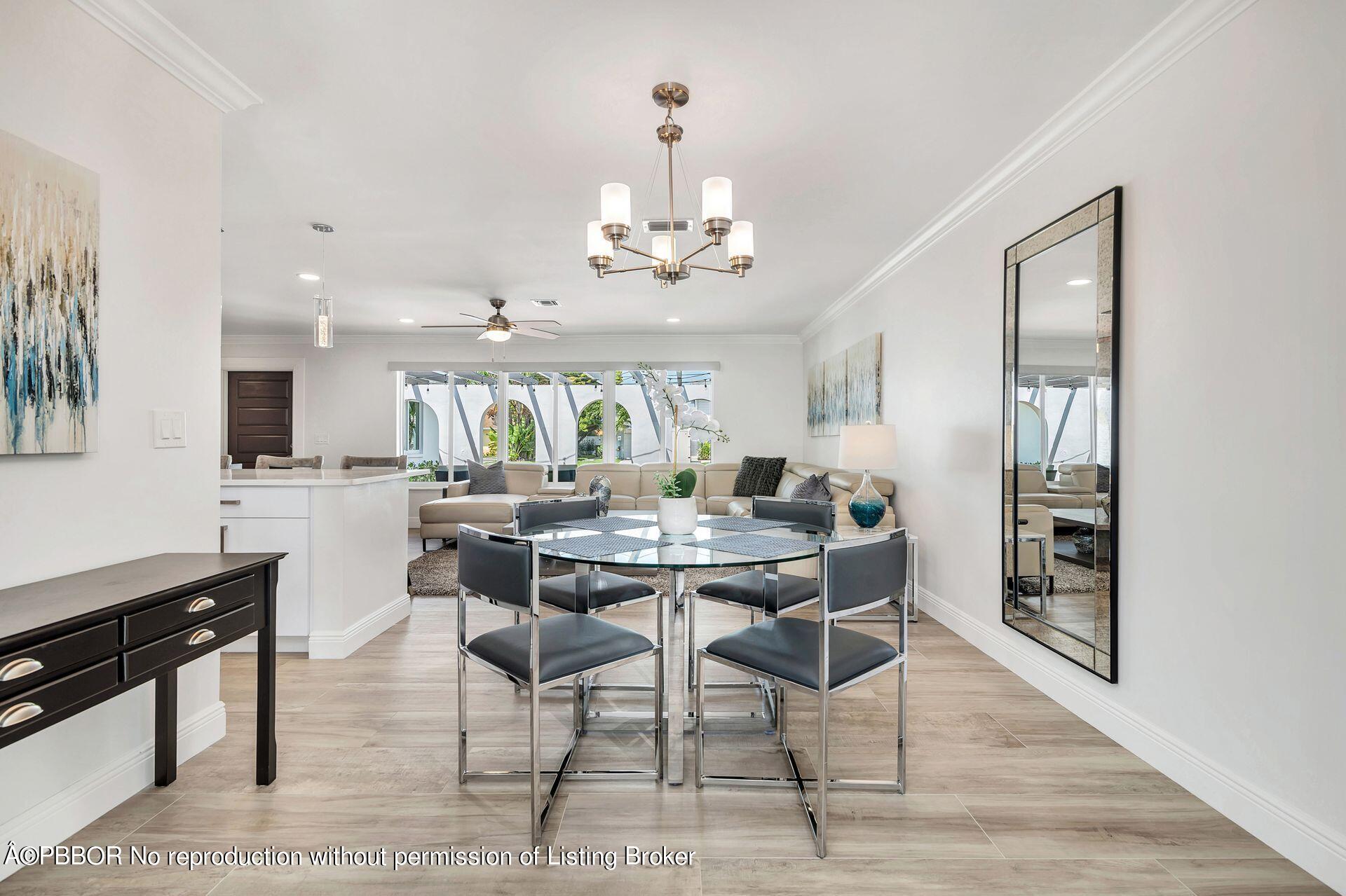 1408 Indian Road East West Palm Beach, FL 33406 - Photo 13 of 50 a view of a dining room with furniture and wooden floor