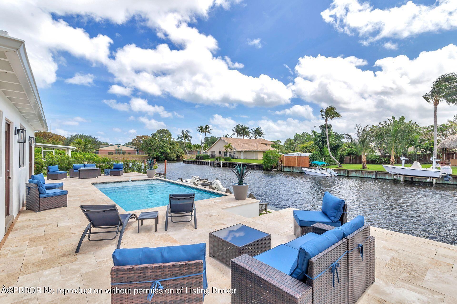 1408 Indian Road East West Palm Beach, FL 33406 - Photo 29 of 50 a view of a terrace with sitting area