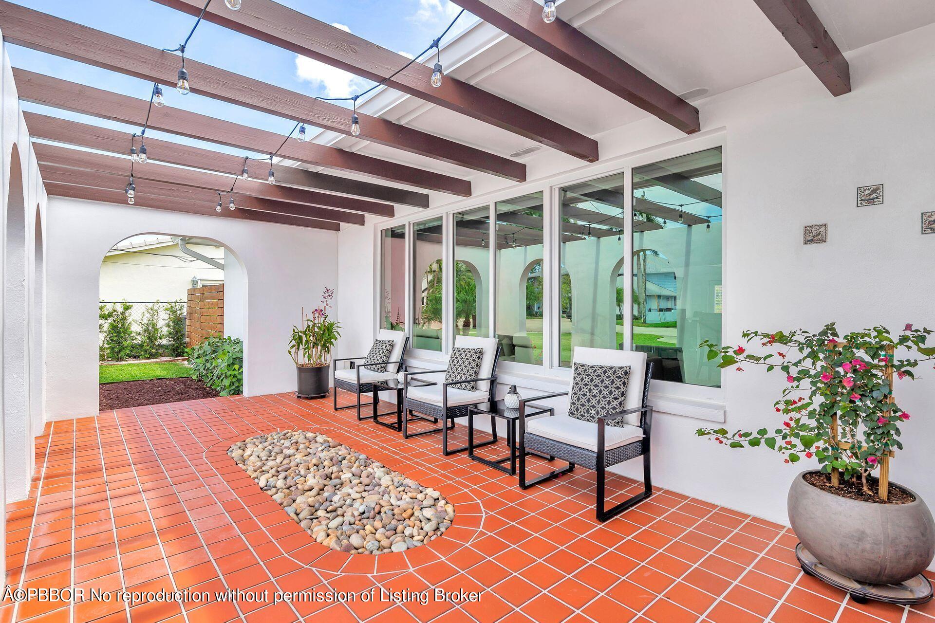 1408 Indian Road East West Palm Beach, FL 33406 - Photo 3 of 50 a outdoor space with lots of seating space