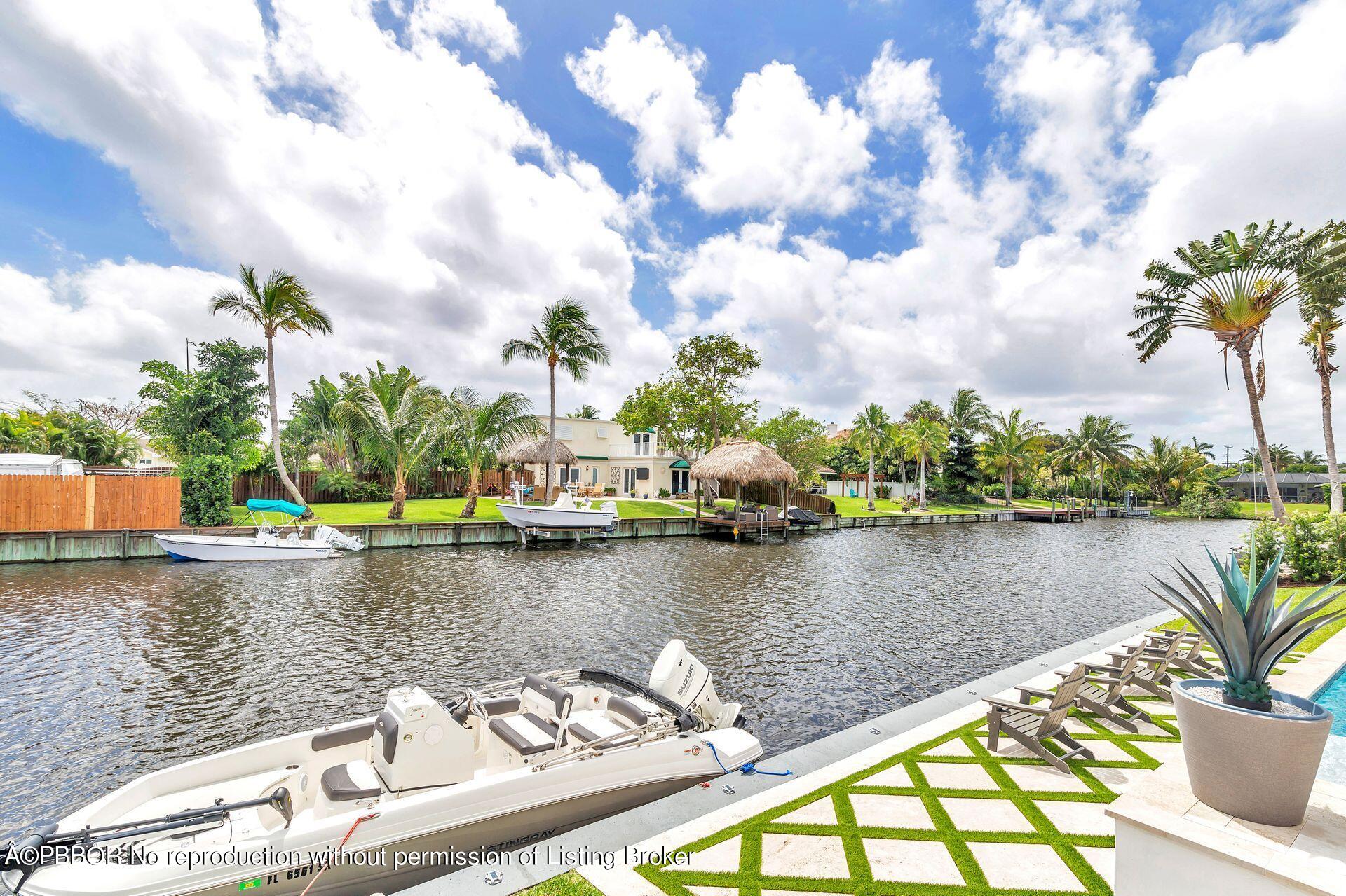 1408 Indian Road East West Palm Beach, FL 33406 - Photo 35 of 50 a view of a lake with houses in the back