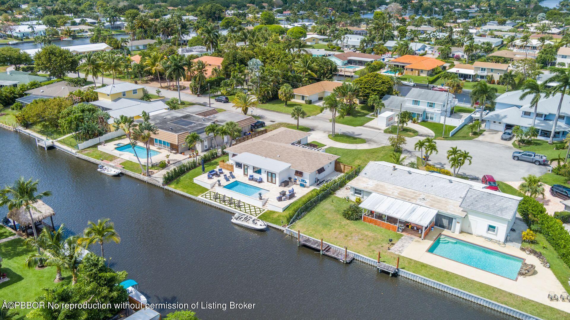 1408 Indian Road East West Palm Beach, FL 33406 - Photo 47 of 50 an aerial view of residential houses with outdoor space and street view