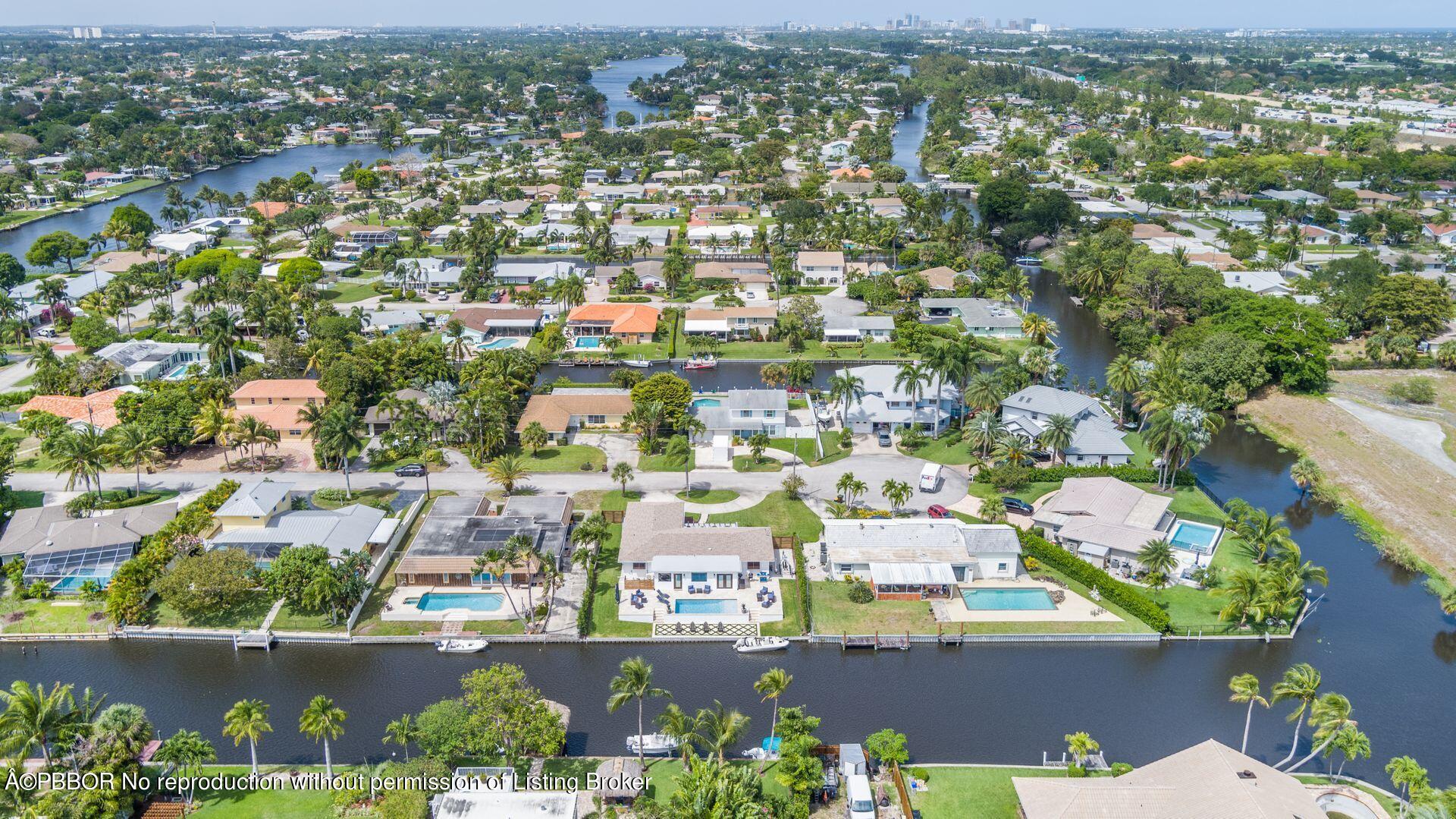 1408 Indian Road East West Palm Beach, FL 33406 - Photo 48 of 50 an aerial view of residential houses with outdoor space