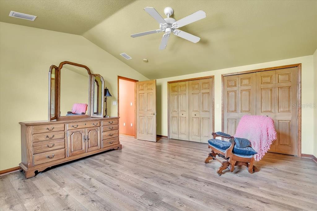 10597 Southwest Kissimmee Road Arcadia, FL 34269 - Photo 35 of 54 a living room with furniture and a large window