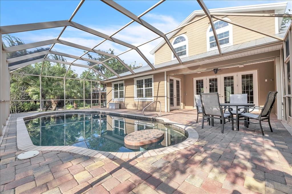 10597 Southwest Kissimmee Road Arcadia, FL 34269 - Photo 41 of 54 a view of a house with backyard sitting area and garden