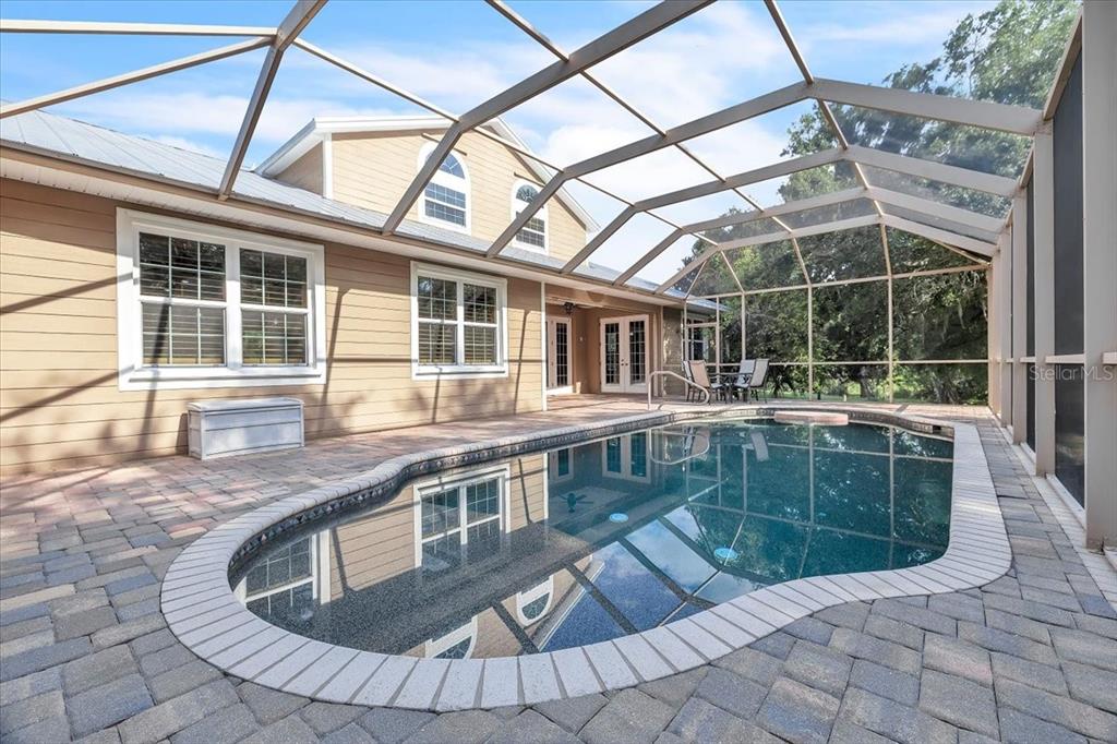 10597 Southwest Kissimmee Road Arcadia, FL 34269 - Photo 42 of 54 a view of a house with roof deck