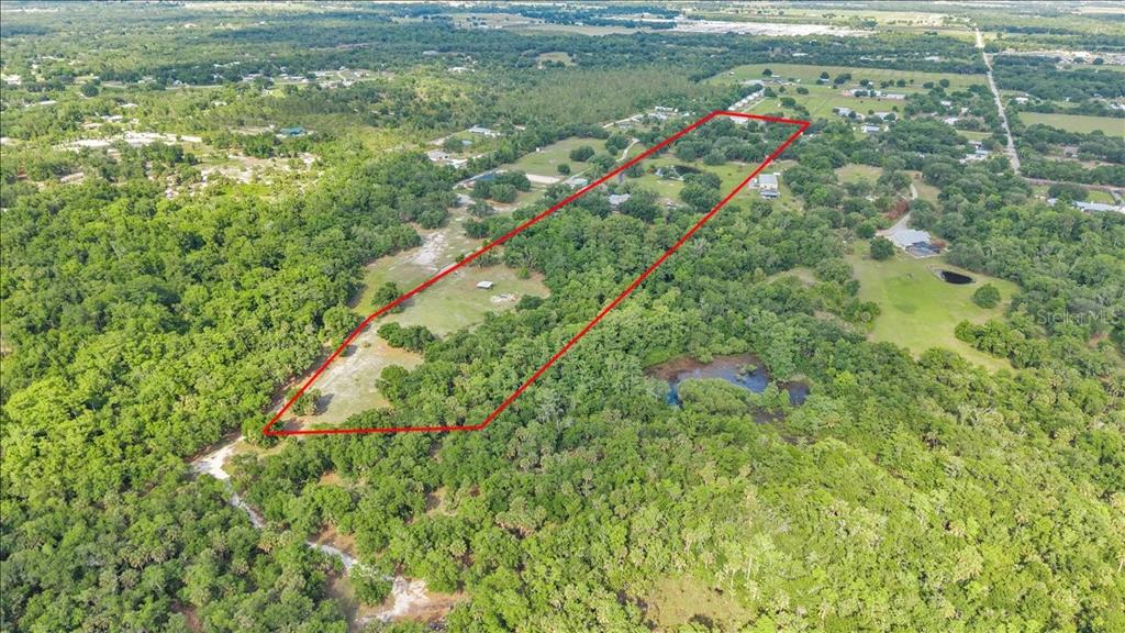 10597 Southwest Kissimmee Road Arcadia, FL 34269 - Photo 52 of 54 a view of a city