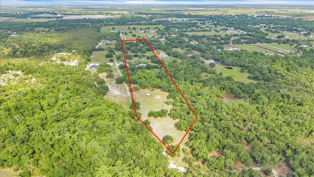 10597 Southwest Kissimmee Road Arcadia, FL 34269 - Photo 53 of 54 a view of lake view and mountain view