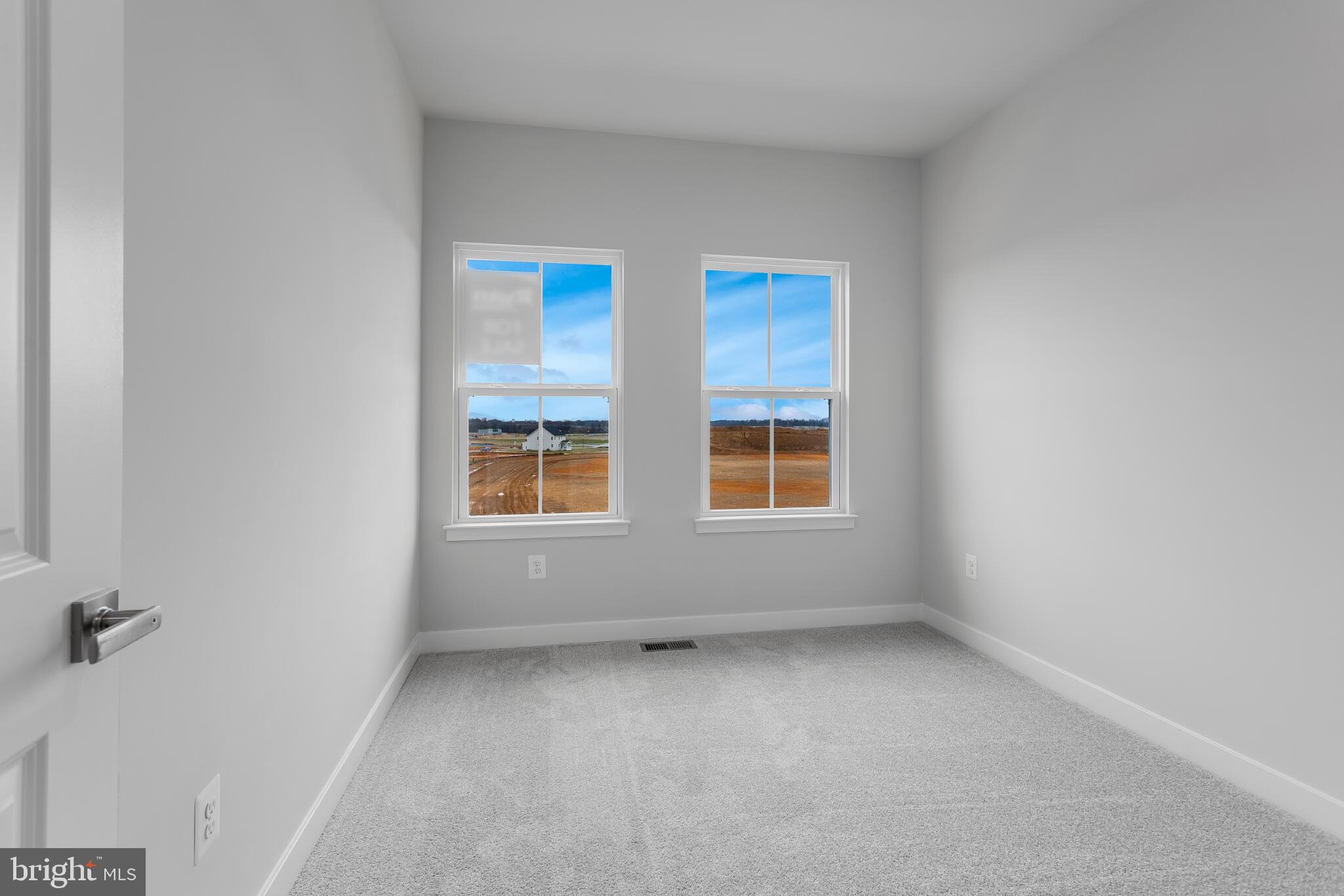 1733 Destrier Street Ranson, WV 25438 - Photo 13 of 22 an empty room with windows