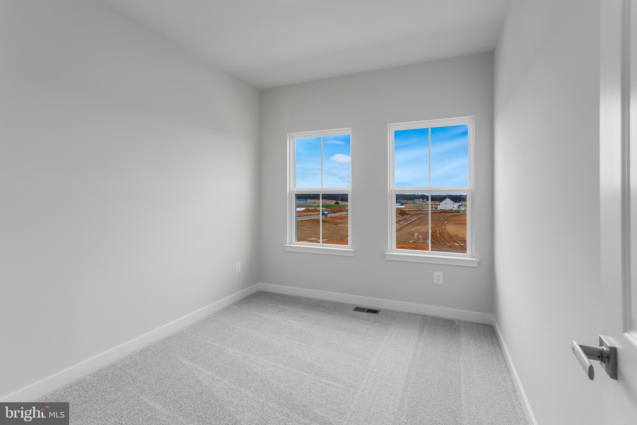1733 Destrier Street Ranson, WV 25438 - Photo 14 of 22 an empty room with a window