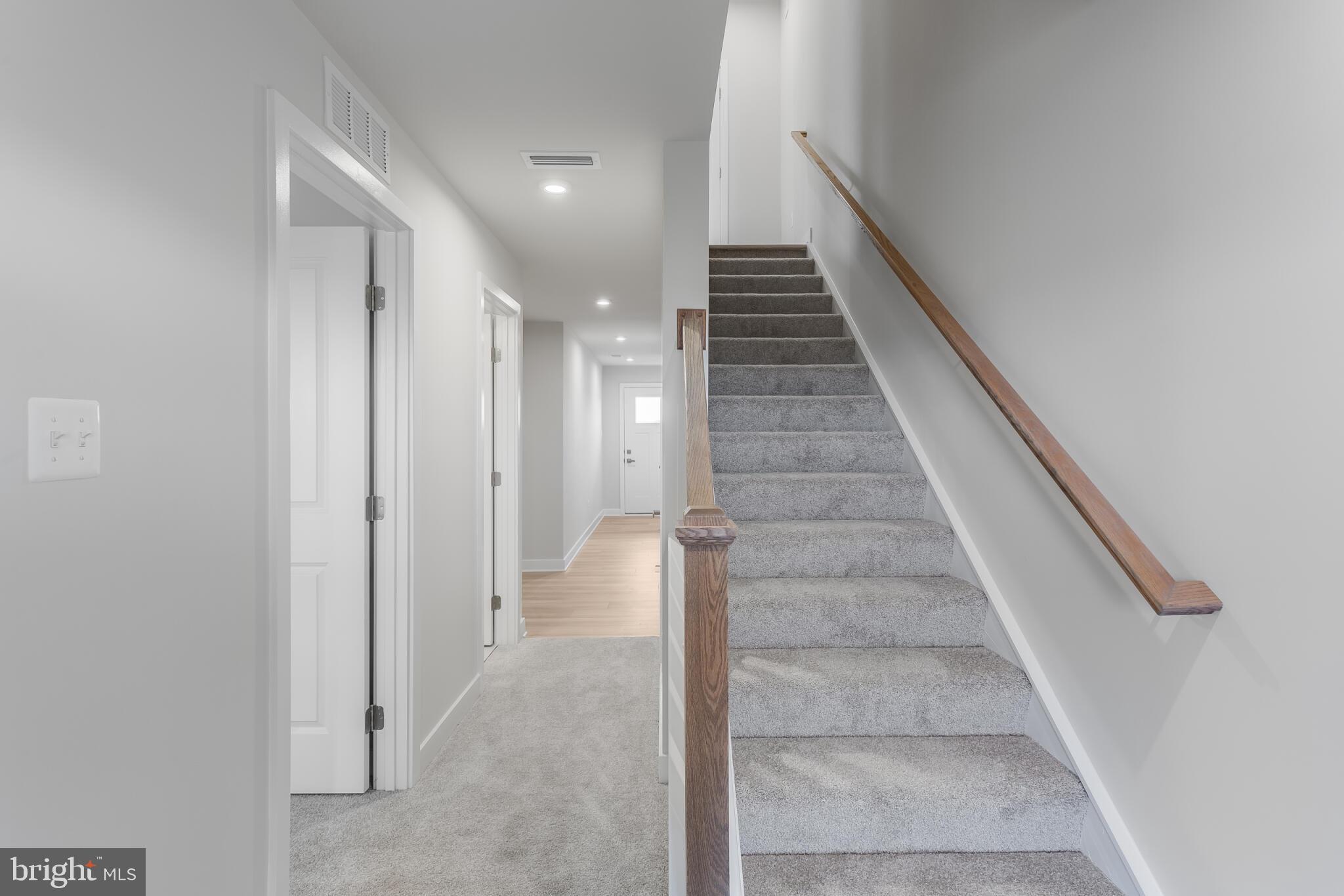 1733 Destrier Street Ranson, WV 25438 - Photo 6 of 22 a view of entryway and hall with wooden floor