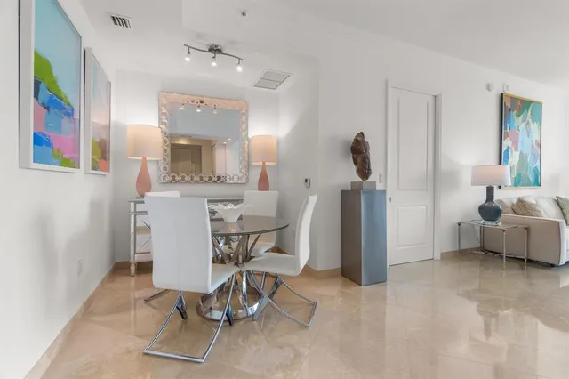 a view of a dining room with furniture