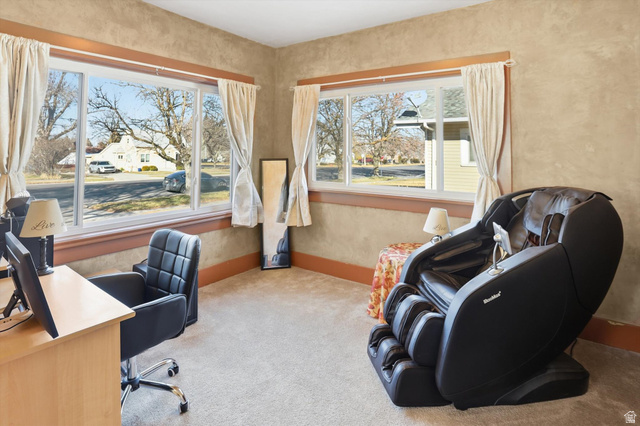 380 North 200 West Logan, UT 84321 - Photo 5 of 29 Office space featuring large windows, light colored carpet and baseboards