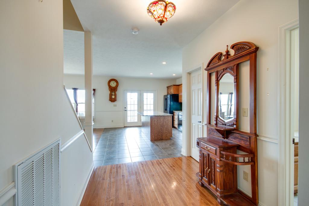 55 Cooley's Rift Boulevard Monteagle, TN 37356 - Photo 4 of 30 a view of a hallway with wooden floor windows