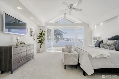 a bed room with a bed and a couch