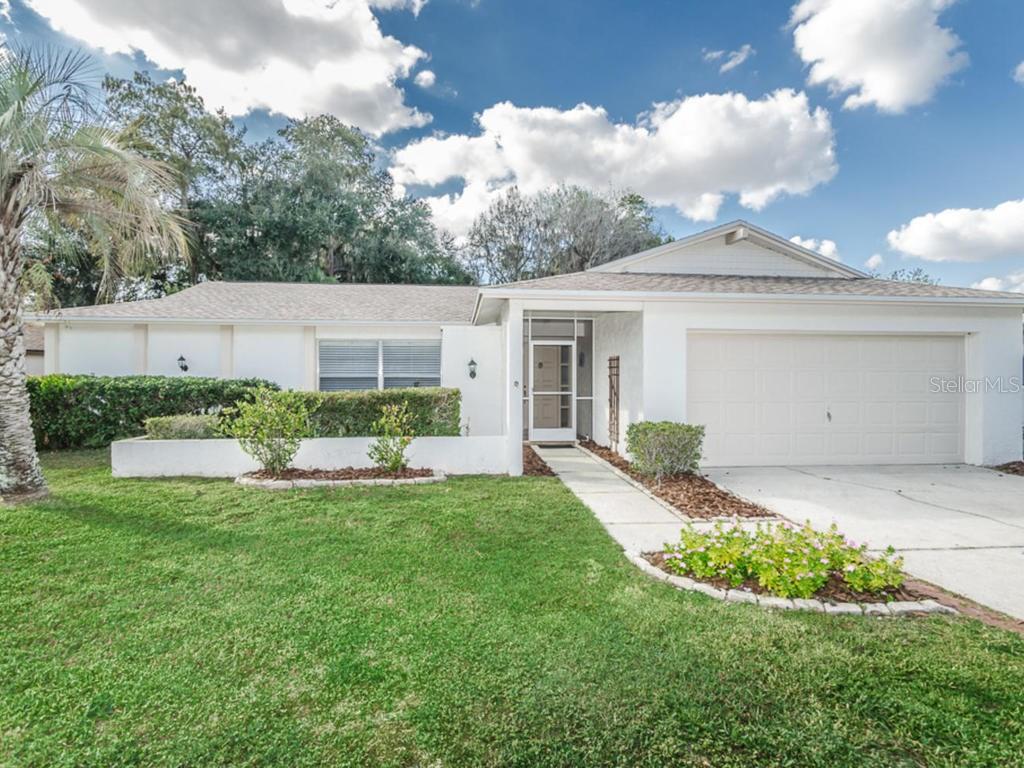 9931 Nicklaus Drive New Port Richey, FL 34655 - Photo 1 of 1 Front Exterior