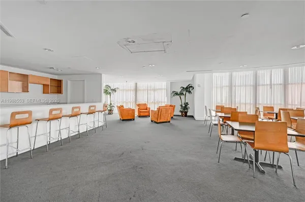 a view of a big room with wooden floor