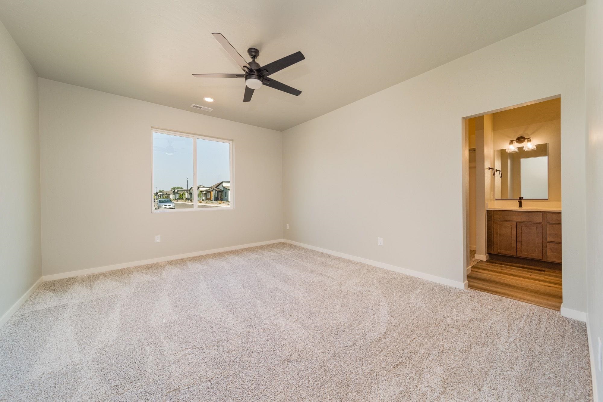 1614 Tungsten Way Fruita, CO 81521 - Photo 16 of 16 a view of an empty room with a window