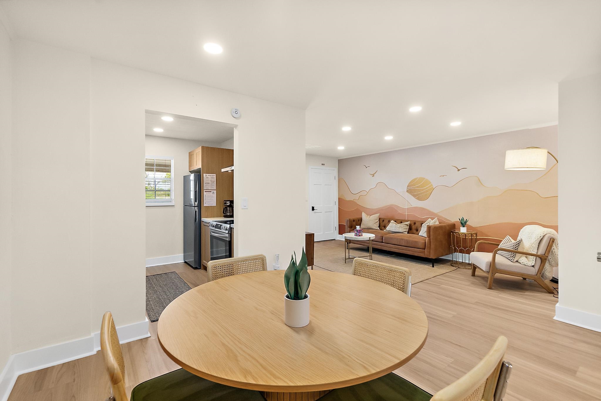 405 Flagler Boulevard, Unit 8A St. Augustine, FL 32080 - Photo 11 of 35 a living room with furniture and a table