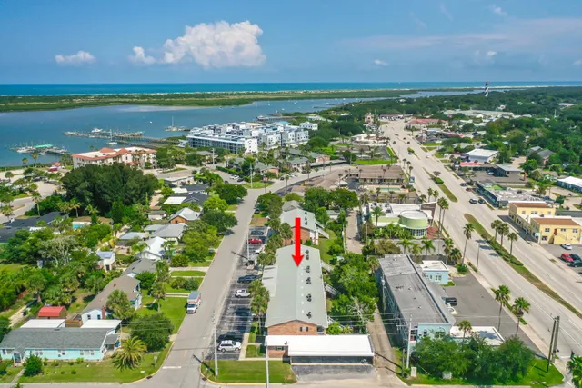 a front view of a house with tree s