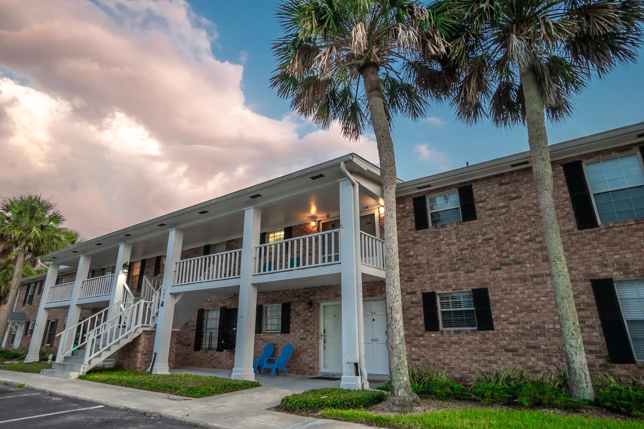 405 Flagler Boulevard, Unit 8A St. Augustine, FL 32080 - Photo 29 of 35 a front view of a house with tree s