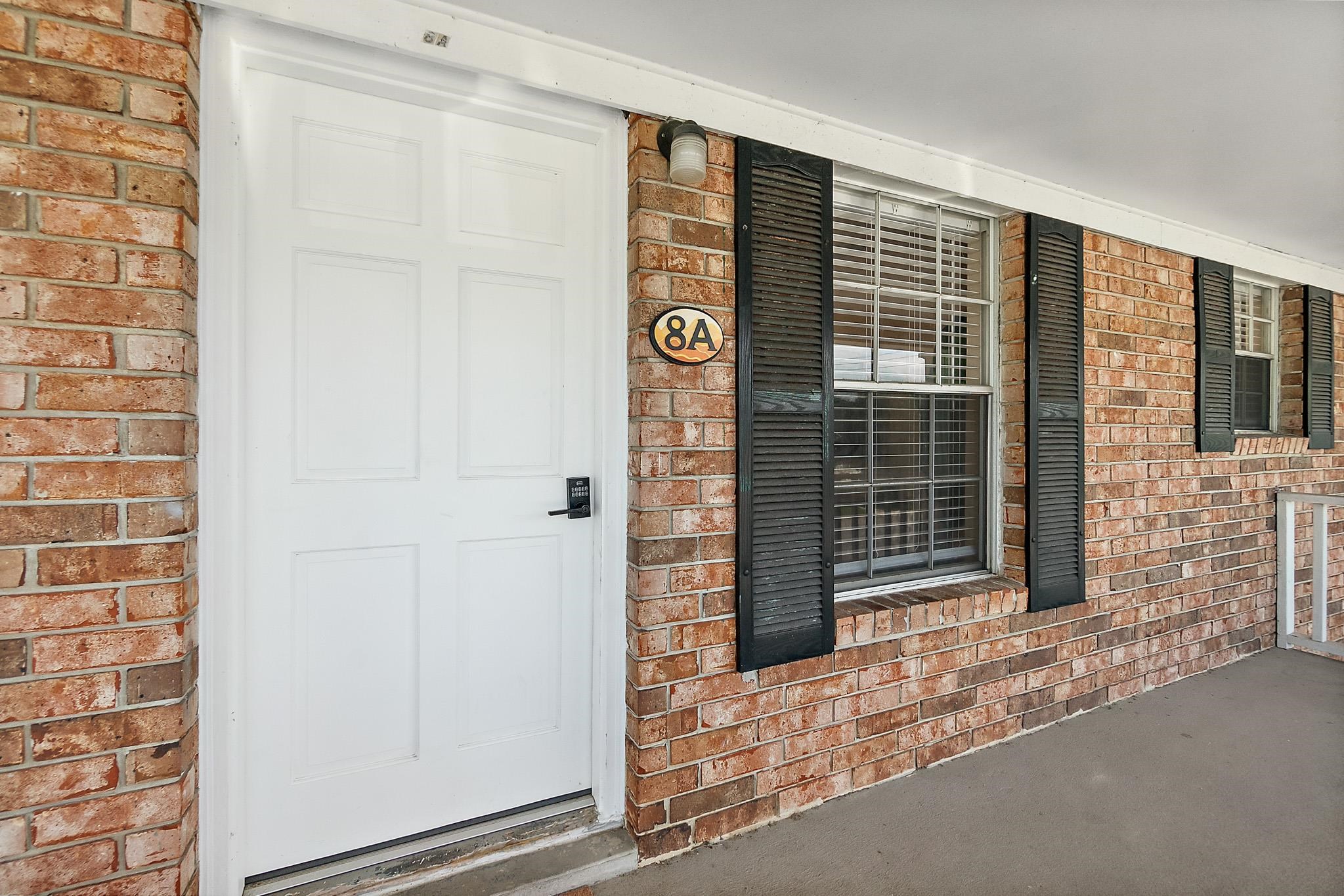 405 Flagler Boulevard, Unit 8A St. Augustine, FL 32080 - Photo 3 of 35 a door view with a outdoor space
