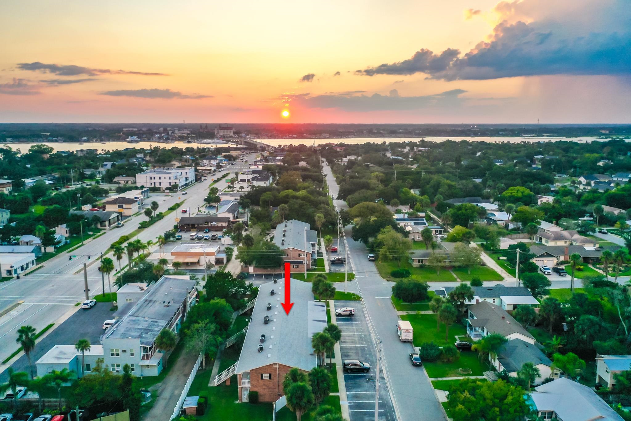 405 Flagler Boulevard, Unit 8A St. Augustine, FL 32080 - Photo 33 of 35 an aerial view of residential houses with outdoor space and ocean view