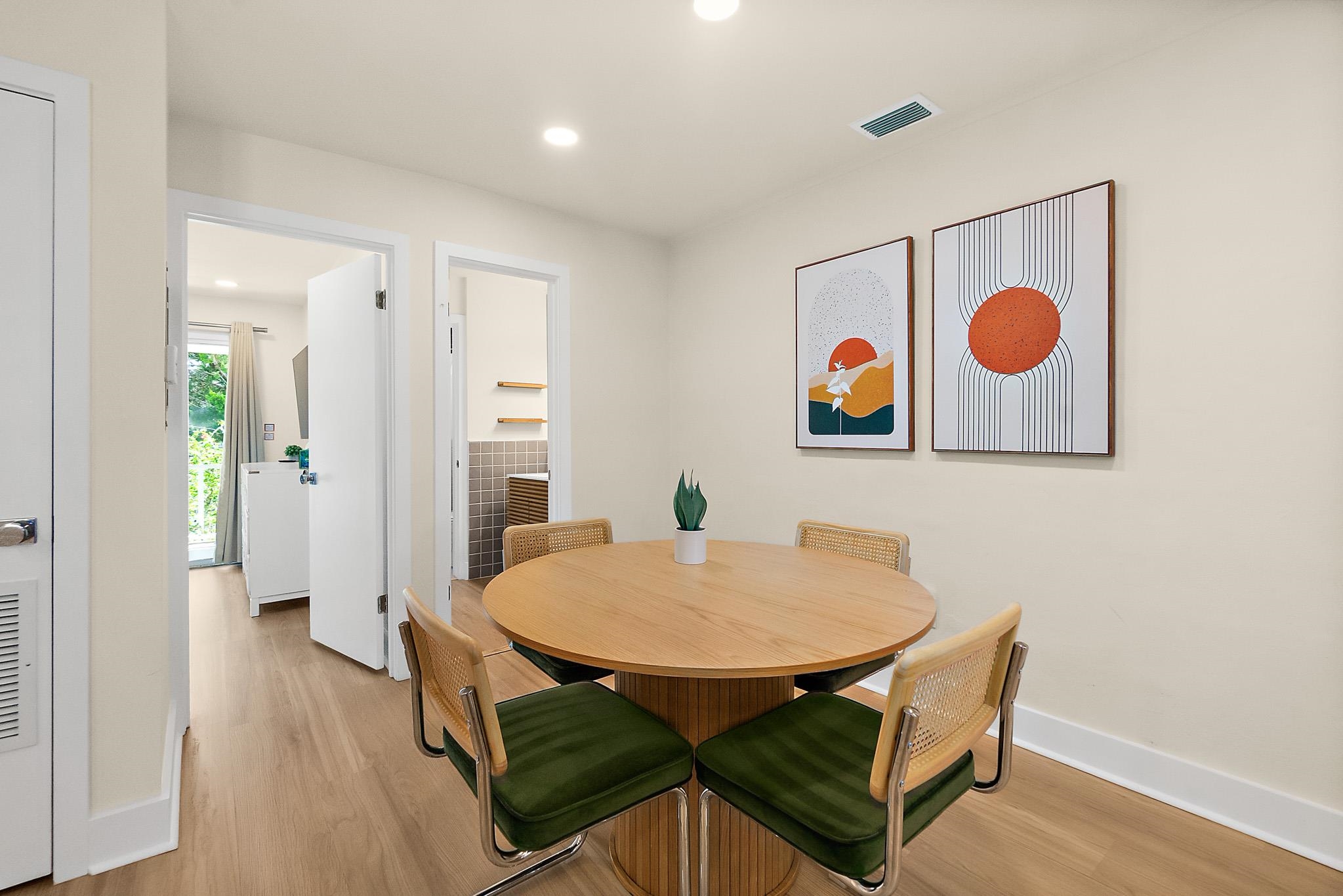 405 Flagler Boulevard, Unit 8A St. Augustine, FL 32080 - Photo 10 of 35 a view of a room with furniture and wooden floor