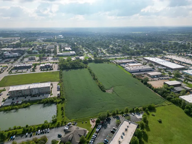 an aerial view of a houses with outdoor space