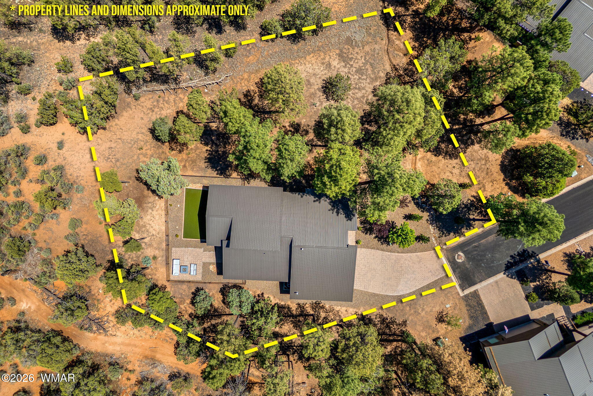 3161 North Eagle Landing Road Show Low, AZ 85901 - Photo 29 of 32 an aerial view of a house with a yard