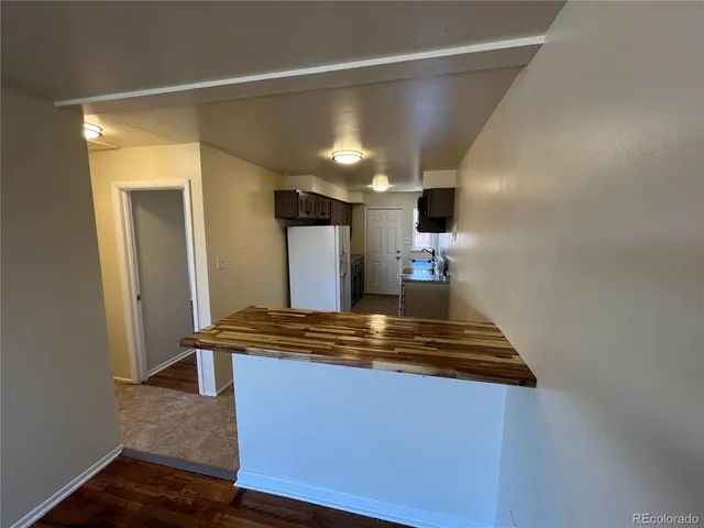 a room with a table and chairs